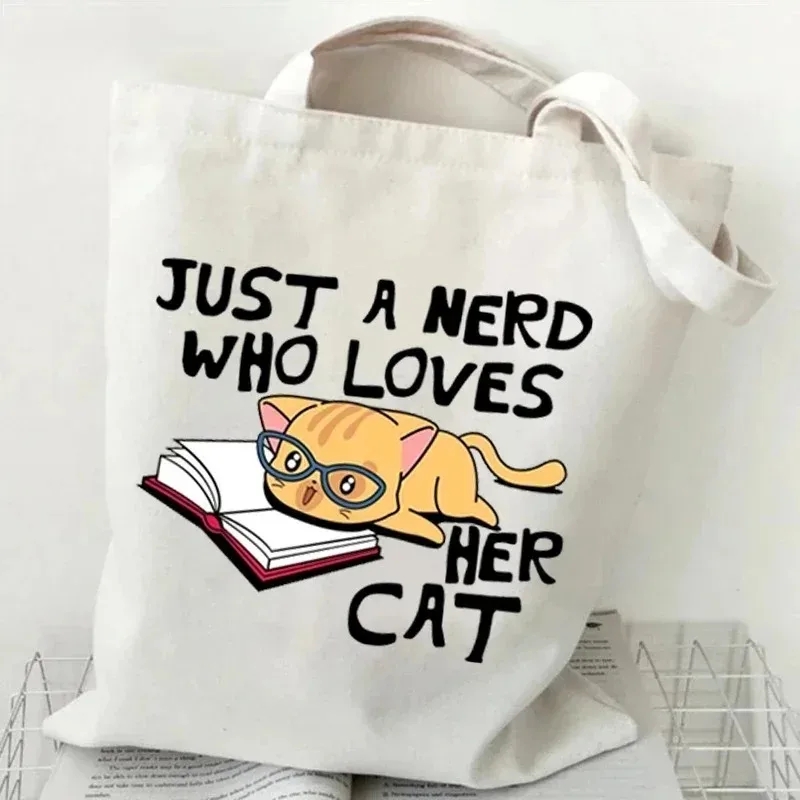 Gato e livro bolsa de lona sen - Tote Bag Canvas Print avaliação e preço